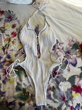 White Womens Textured One-Piece Swimsuit with size cut outs and middle size sm